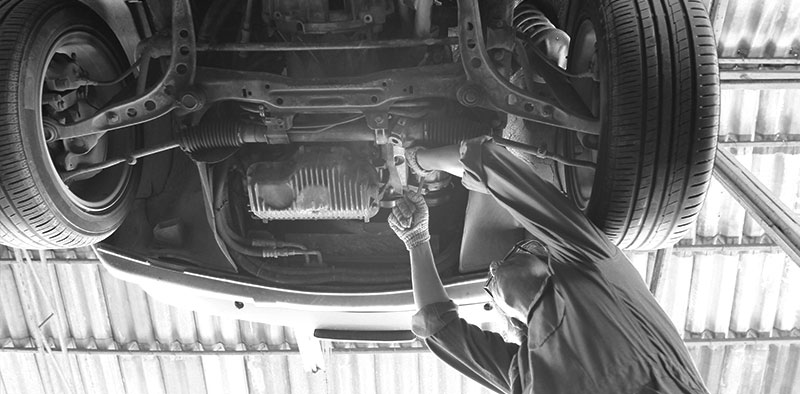 Mechanic Working on a car - Tokyo Automotive - Buena Park
